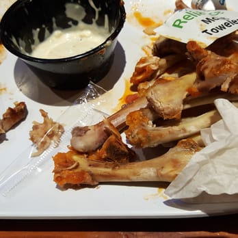 Twin Peaks - Sorry I forgot to leave the meat on! Good wings, hot and BBQ was this portion. - New American Near Me - Hoover, Alabama