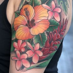 Mid-Pacific Tattoo - Hawaiian floral Tattoo done by Tommy Tingle at Mid-Pacific Tattoo In Bonita Springs Florida