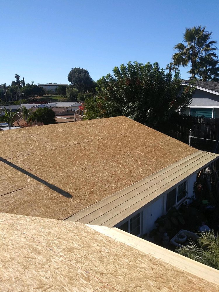 Slide of Father And Son Roofing.