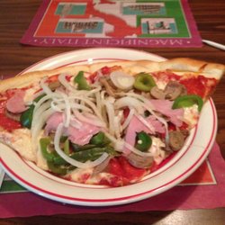 Pizza Garden Italian Restaurant - 2 Combination slices. The pepperoni and cheese were already there and the veggies were just thrown on.  Like a salad on top of the pizza.