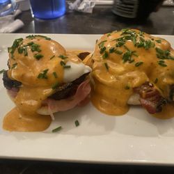 Special: burnt pork ends eggs Benedict with pickled onions.
