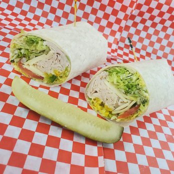 Idleyld Trading Post & Deli - a sandwich cut in half with a pickle - Grocery Near Me - Idleyld Park, Oregon Idleyld Trading Post & Deli - a sandwich cut in half with a pickle - Grocery Near Me - Idleyld Park, Oregon
