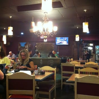 Dos Amigos - How odd. A fountain in the middle of the restaurant with a chandelier directly above it - Mexican Near Me - Elko, Nevada Dos Amigos - How odd. A fountain in the middle of the restaurant with a chandelier directly above it - Mexican Near Me - Elko, Nevada