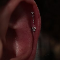 GS Piercing Studio - 2 fresh helix piercings by Chris, both with White Gold jewelry  so perfectly fit to the anatomy and personality of our beautiful client!