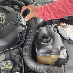 Mr.Mobile Repair - Ford Mustang GT and the blown radiator hose.