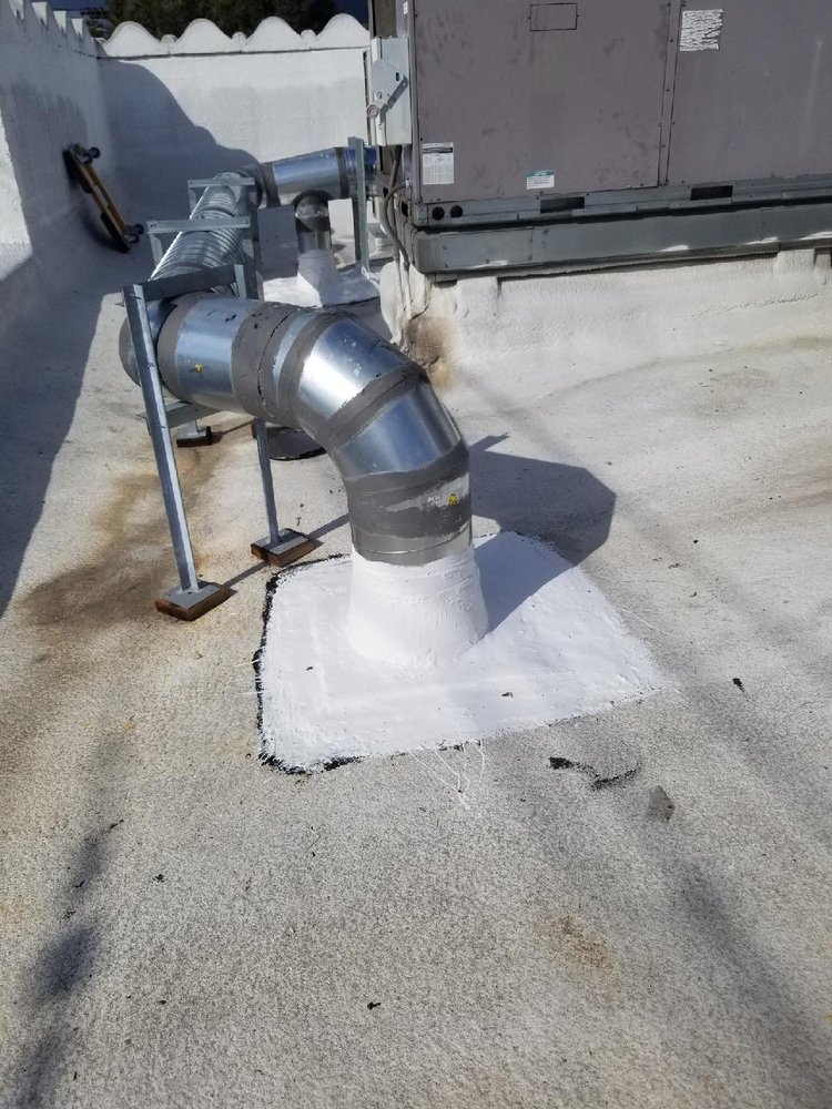 Slide of Huncho Roofer