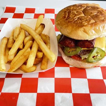 The Hideaway Burgers And More - Jalapeño Sausage Burger. It's a Cheeseburger topped with Smoked Sausage and Grilled Jalapeños!! - Burgers Near Me - Plains, Texas The Hideaway Burgers And More - Jalapeño Sausage Burger. It's a Cheeseburger topped with Smoked Sausage and Grilled Jalapeños!! - Burgers Near Me - Plains, Texas