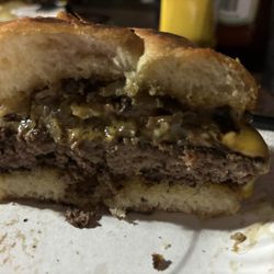 Kahootz Draft House - Manly burger 3 kinds of cheese, mushrooms, onions, bacon, and toasted bun!