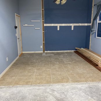 Integral Homes - 3rd bedroom demo, closet removed. There's was a private bathroom access built into that wall once closet was removed. - General Contractors Near Me