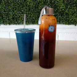 Kuma - Regular hyper potion (left) and Thai tea in reusable glass bottle (right)