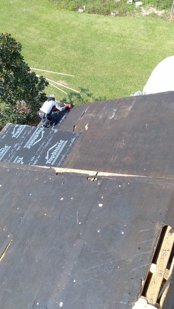 Slide of J&K Roofing Company