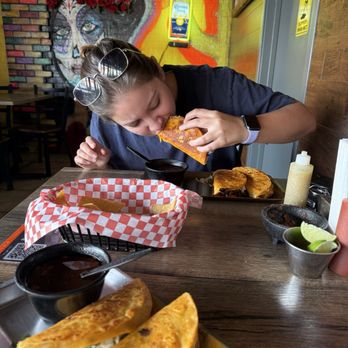 Birria - Bite - fiancée's first bite of the 3 Quesabirrias Combo (beef) - Mexican Near Me - Las Vegas, Nevada Birria - Bite - fiancée's first bite of the 3 Quesabirrias Combo (beef) - Mexican Near Me - Las Vegas, Nevada