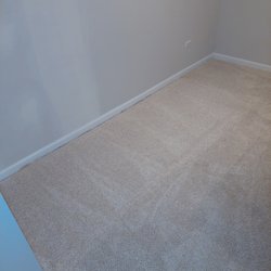 Proper Carpet Cleaning - After Picture of pad install, Tack strips and carpet. WOW!