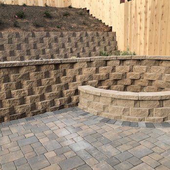Calderon's Landscape - New fence, pavers, proper drainage, second retaining wall, fire ring, ground cover - Landscaping Near Me Calderon's Landscape - New fence, pavers, proper drainage, second retaining wall, fire ring, ground cover - Landscaping Near Me