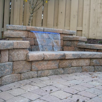 Carrington Lawn & Landscape - a water feature in a garden - Snow Removal Near Me - Middleton, Wisconsin Carrington Lawn & Landscape - a water feature in a garden - Snow Removal Near Me - Middleton, Wisconsin