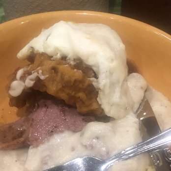 Sunrise Memphis - Fried chicken, ham, gravy, over easy egg, and a biscuit. - Breakfast & Brunch Near Me - Memphis, Tennessee Sunrise Memphis - Fried chicken, ham, gravy, over easy egg, and a biscuit. - Breakfast & Brunch Near Me - Memphis, Tennessee