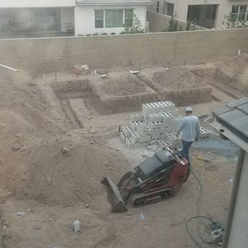 Landmark Custom Landscape - On construction building a pool size pond. - Landscaping Near Me - Irvine, California