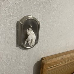 Mcdermitt Gas Motel - Tissue poked into old light fixtures on wall over bed