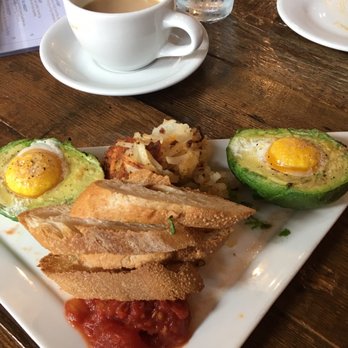 Farm Bell Kitchen - Avocado with baked eggs and toast - Southern Near Me - Charlottesville, Virginia Farm Bell Kitchen - Avocado with baked eggs and toast - Southern Near Me - Charlottesville, Virginia