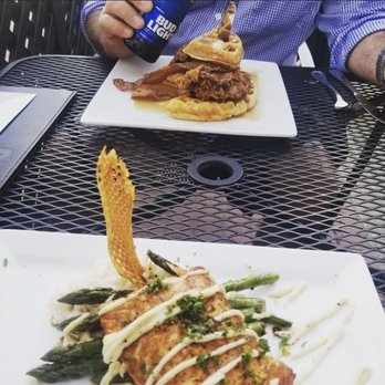 Table 14 - Bay of fundy salmon and chicken and waffles. Both delicious! - Southern Near Me - Ludington, Michigan