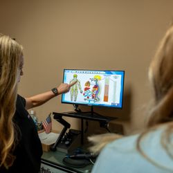 Fowler ProChiropractic & Wellness Center - Reviewing nerves scans to get to the root of the problem.