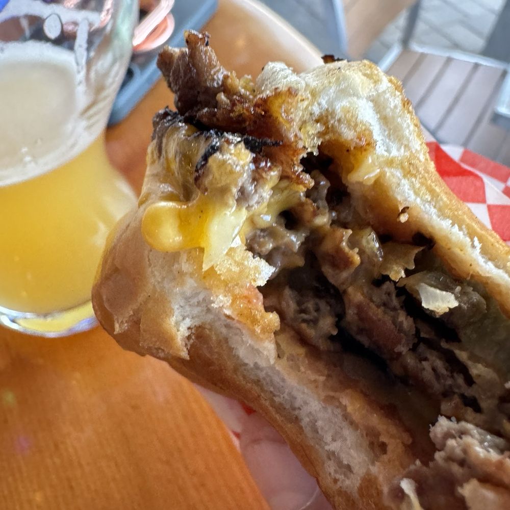 "Helical Haze" beer and "Just The Tip" smash burger. "Helical Haze" beer and "Just The Tip" smash burger.