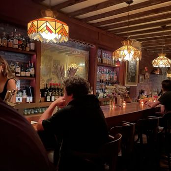 The York - a group of people sitting at a bar - Gastropubs Near Me - New York, New York