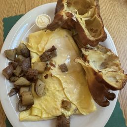 Make your own omelette with popover and home fries.