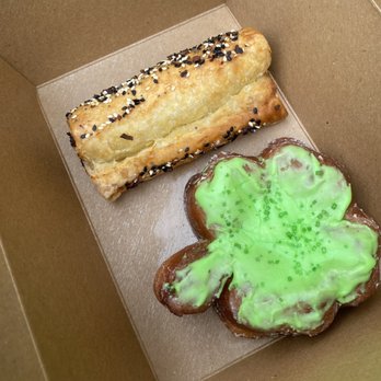 Valkyrie Doughnuts - Vanilla shamrock donut and sausage roll - Donuts Near Me - St. Petersburg, Florida Valkyrie Doughnuts - Vanilla shamrock donut and sausage roll - Donuts Near Me - St. Petersburg, Florida