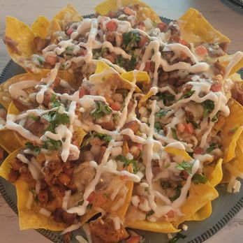 Ta’Chingon Mexican Kitchen - Nachos (Grilled chicken,  avocado salsa on the side) - Mexican Near Me - Winter Park, Florida