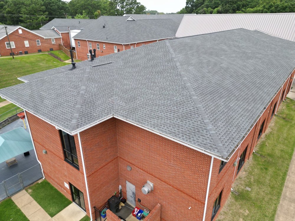 Slide of RiverLand Roofing