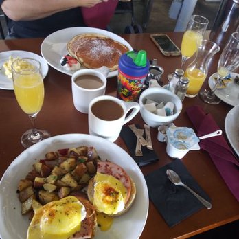 Colette - Delicious mimosas with the bucket at our table. $20 for bottle + oj - Breakfast & Brunch Near Me - Pasadena, California