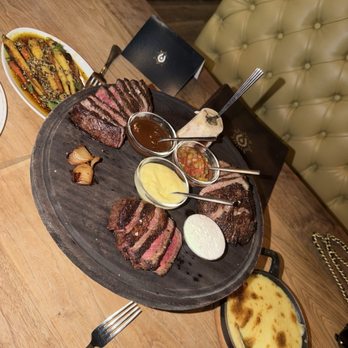 Rare Society - Associate Board with divine sauces and 2 sides. Whipped potatoes and glazed carrots - Steakhouses Near Me - San Diego, California