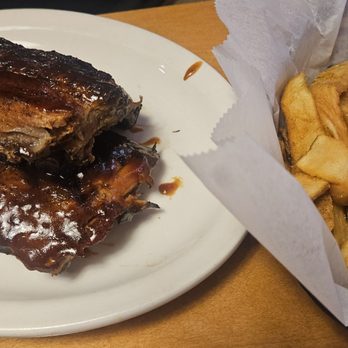 Texas Roadhouse - Full rack of ribs and fries - Steakhouses Near Me - Leander, Texas