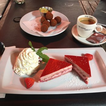 De Witte Leeuw - Cake of the day with coffee (foreground). Bitterballen (Dutch meatballs) behind. - Belgian Near Me - Gent, VOV