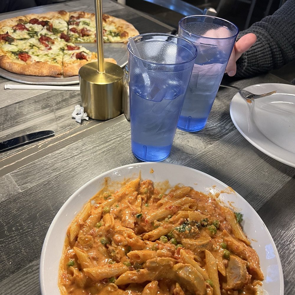 Enrico's - Penne Vodka Pesto pizza special - Italian Near Me - Charlotte, North Carolina
