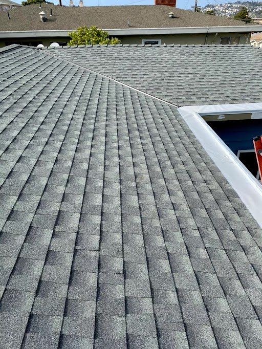 Slide of Mel's Roofing