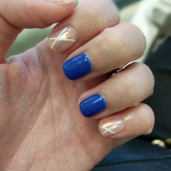 Chloe Nail - The non-blue nails look like shattered glass, really pretty! - Nail Salons Near Me Chloe Nail - The non-blue nails look like shattered glass, really pretty! - Nail Salons Near Me