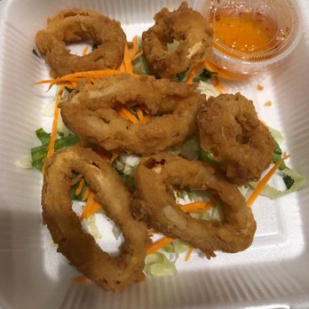 Sweet Basil Thai Bistro - Calamari... not worth $9. There is no seasoning on it at all - Thai Near Me - Denton, Texas Sweet Basil Thai Bistro - Calamari... not worth $9. There is no seasoning on it at all - Thai Near Me - Denton, Texas
