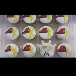 Tutti's Cookies and Shakes - Fireman hat cupcakes!
