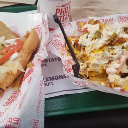 Buffalo chicken sandwich and nacho fries.