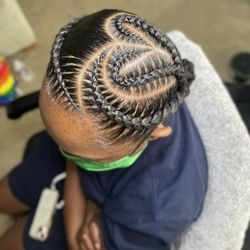 2 (two) stitch braids with heart design bun finish