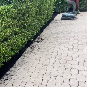 All Around Groundkeepers - Trimmed shrubs and put new mulch around the entire property - Tree Services Near Me - Margate, Florida