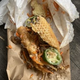 Soggy bánh mì fell apart after two bites Soggy bánh mì fell apart after two bites