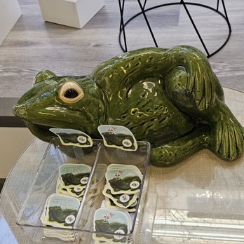 Art On 1st - A frog with stickers on a table. - Art Classes Near Me - Roanoke, Virginia