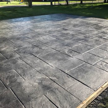 Dynamic Construction Team - Ashlar slate stamped patio - General Contractors Near Me