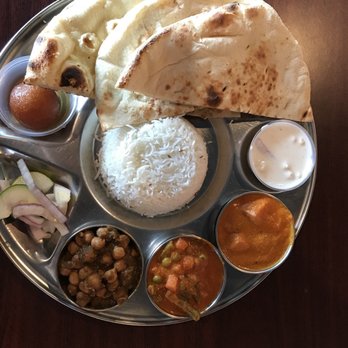 Phulkari Punjabi Kitchen - Vegetarian Thali with extra garlic naan bread - Indian Near Me - Madison Heights, Michigan Phulkari Punjabi Kitchen - Vegetarian Thali with extra garlic naan bread - Indian Near Me - Madison Heights, Michigan