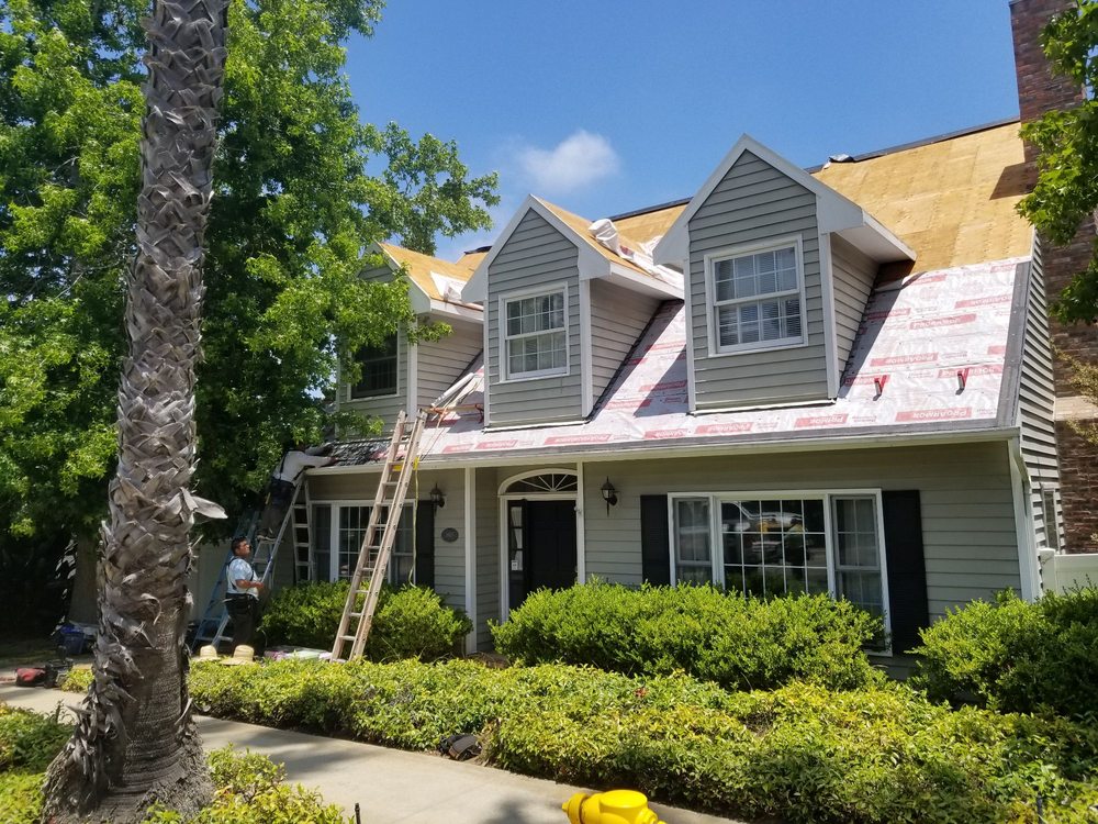 Slide of JC Roofing Services