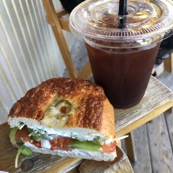 The Bean - The Gardner with cream cheese and cheddar jalapeño bagel. Iced americano - Coffee & Tea Near Me - Kellogg, Idaho