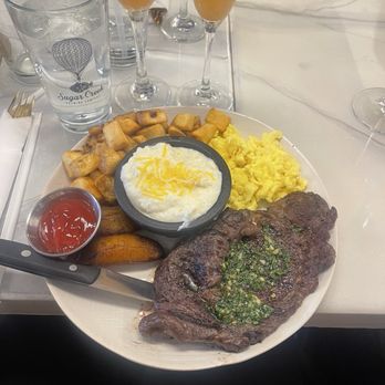 Bella Fusion Restaurant - Steak and Eggs (no black beans sub grits) - Latin American Near Me - Charlotte, North Carolina Bella Fusion Restaurant - Steak and Eggs (no black beans sub grits) - Latin American Near Me - Charlotte, North Carolina